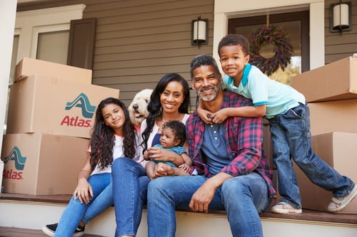 Atlas-Family-on-porch-with-boxes-WEB